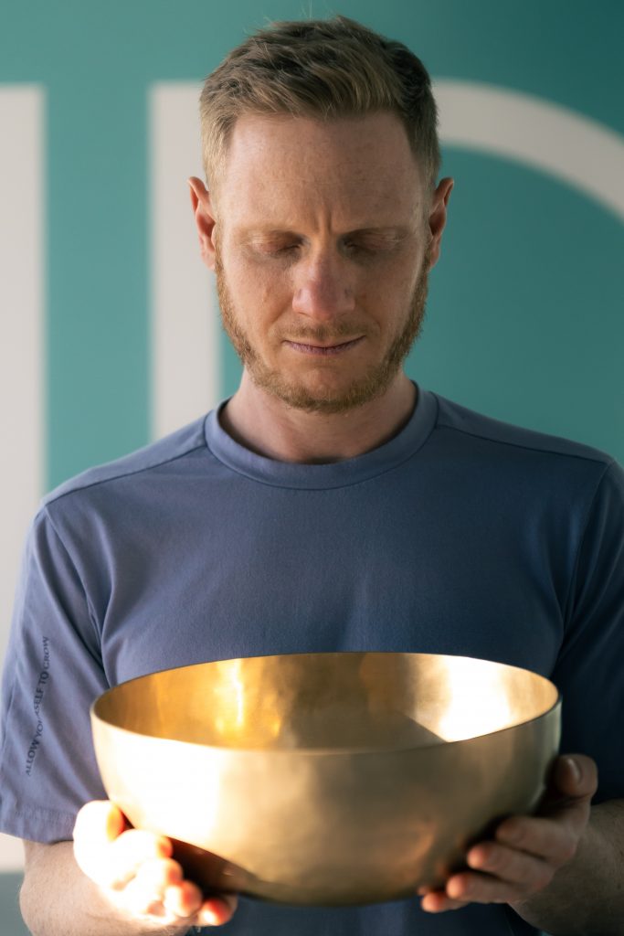 Chris holding one of the Tibetan Sound Bowls.