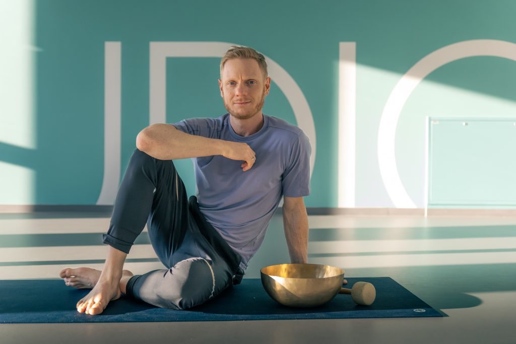 Chris with Sound Healing bowl. The bowls originate from North India and there are 7 different ones for 7 different chakras.